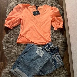 Cross front ruffled Peach 🍑 top .